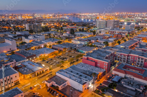 Aerial view of Downtown San Pedro facing Vincent Thomas Bridge and Long Beach at Twilight