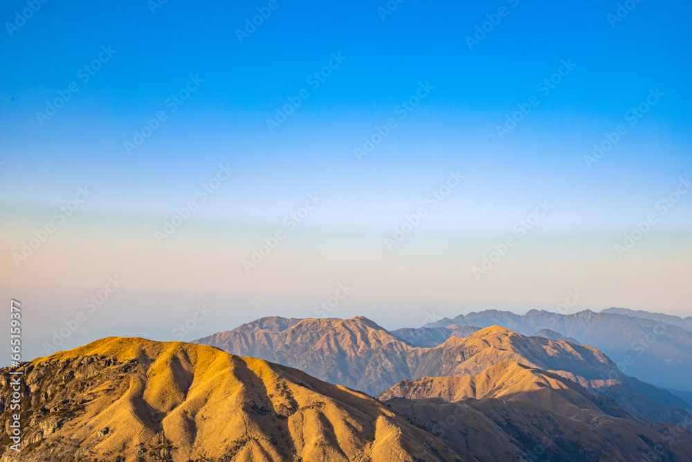 Naklejka premium Wugong Mountain, Pingxiang City, Jiangxi Province - sea of clouds and mountain scenery at sunset