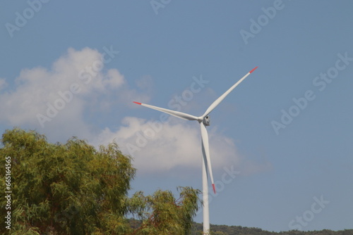 Wind turbines spinning in the wind energy station in mountain