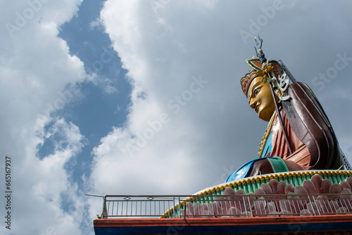 Dakshinkali, Nepal: the 40 metres high statue of Guru Rinpoche (Padmasambhava, Born from a Lotus), tantric Buddhist Vajra master, built in 2012, overlooking Dollu and Pharping monasteries photo