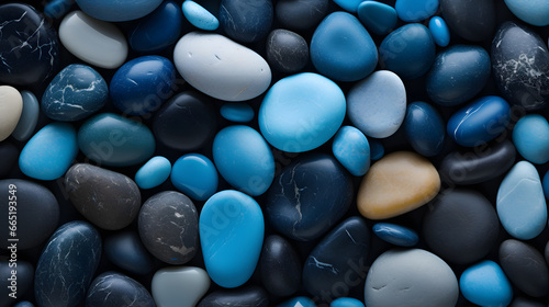 pebble background close up - blue and black stones