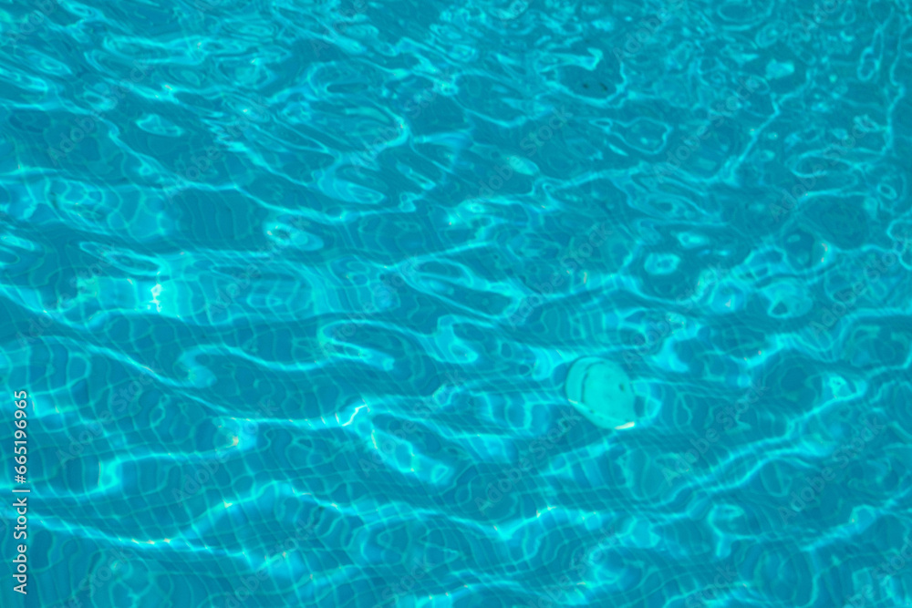 Pool water of Cyprus Ayia Napa, sun lens flares