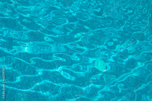 Pool water of Cyprus Ayia Napa, sun lens flares