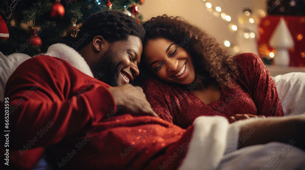 Happy couple in christmas night at home.