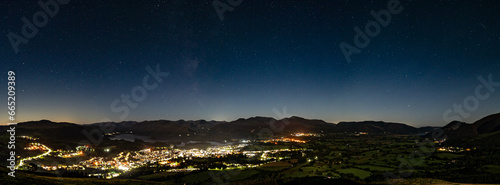 A panoramic view of a moonlit Keswick in the English Lake District taken from Lattrig.