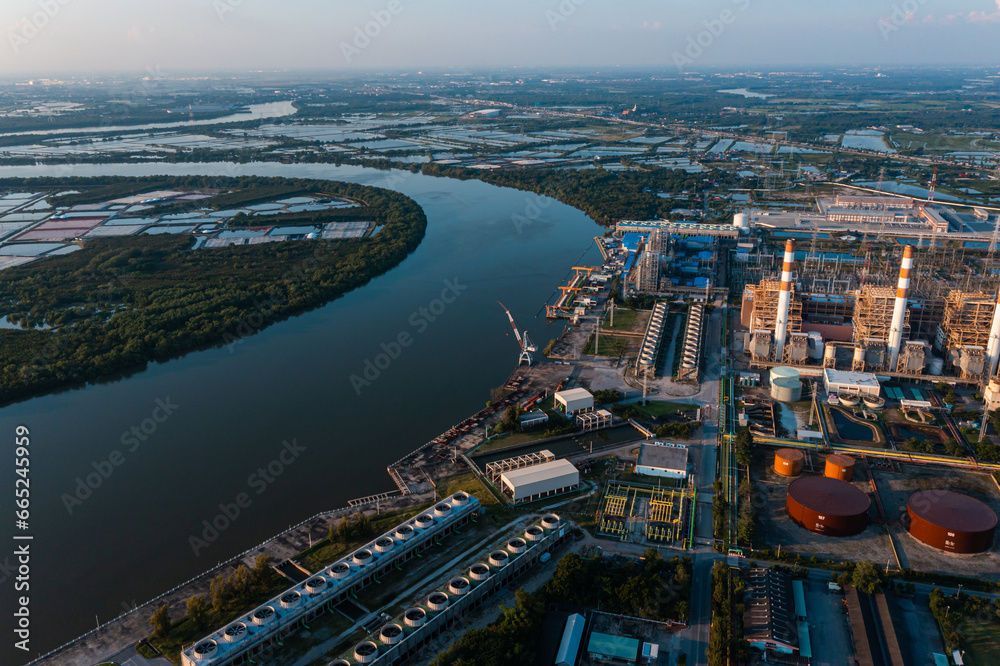 Aerial view Bang Pakong power plant of gas power plant, Thermal power plants and fuel oil, Thermal power plants and fuel oil. electrical power plant. energy concept, morning sky