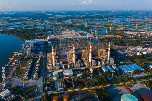 Aerial view Bang Pakong power plant of gas power plant, Thermal power plants and fuel oil, Thermal power plants and fuel oil. electrical power plant. energy concept, morning sky