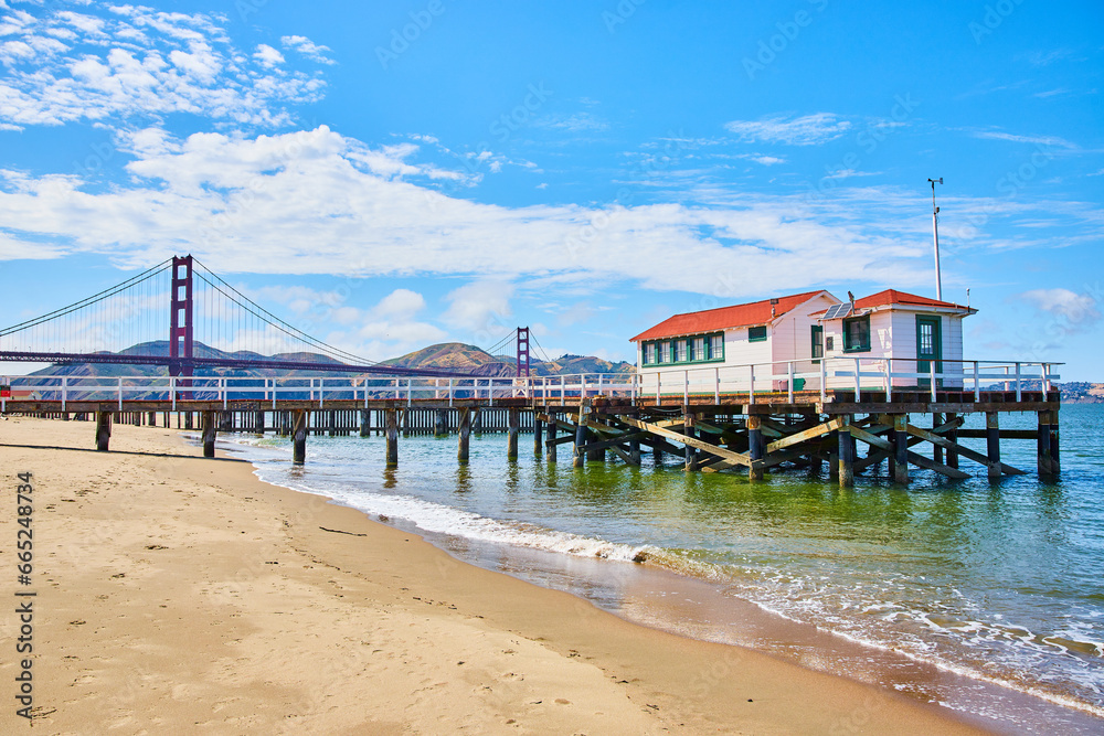 Gorgeous summer day on San Francisco Bay with beach and pier in front of Golden Gate Bridge Gorgeous summer day on San Francisco Bay with beach and pier in front of Golden Gate Bridge