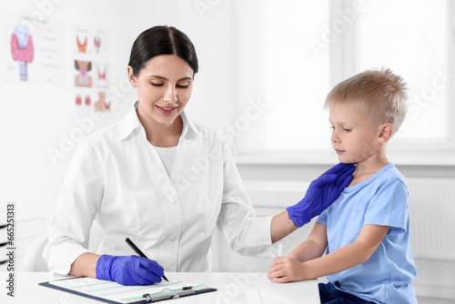 Little boy having appointment with endocrinologist at hospital