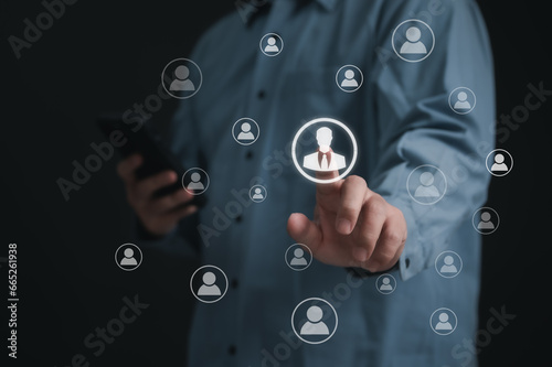 Recruitment people or Human Resource Management (HR) concept : Bussinessman using finger for choose human development recruitment leadership and customer target group to enter the position in company