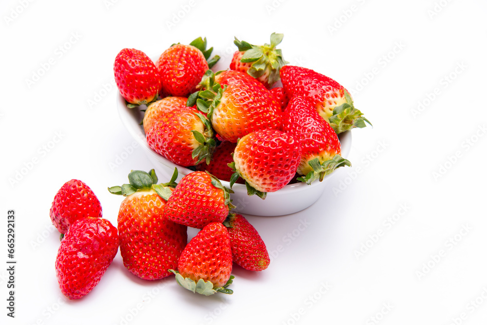 Strawberries in dish on white background with room for message Strawberries in dish on white background with room for message
