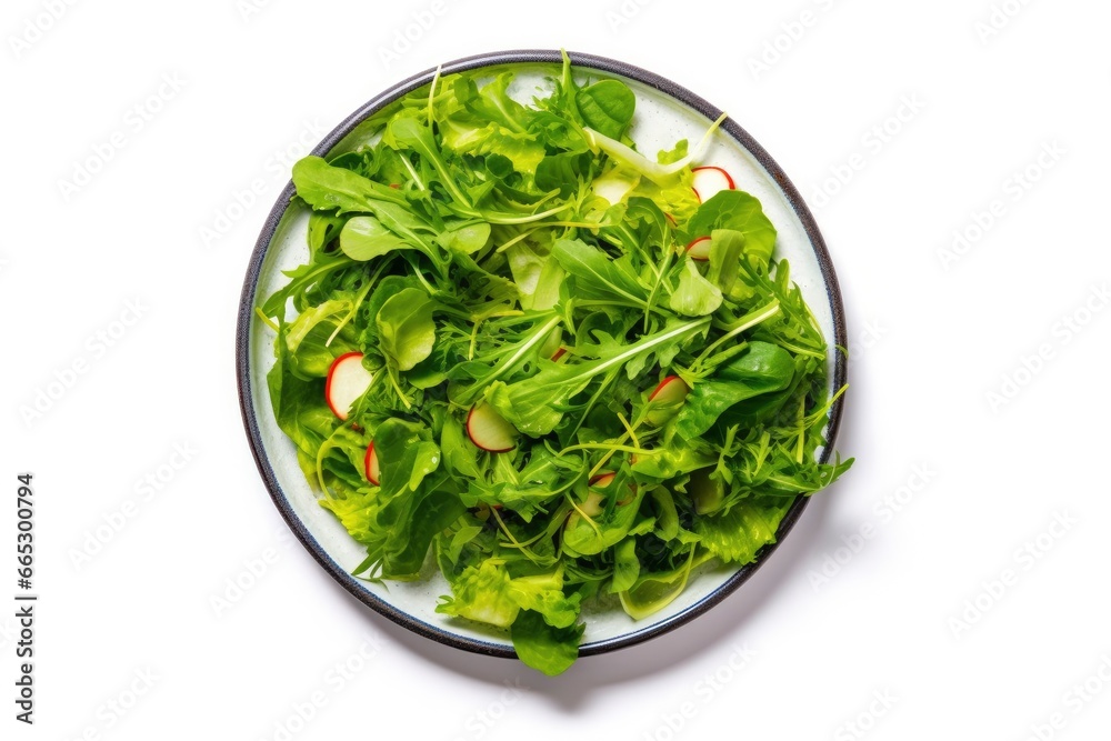 Healthy fresh green salad plate shot from above on white background. Healthy fresh green salad plate shot from above on white background.