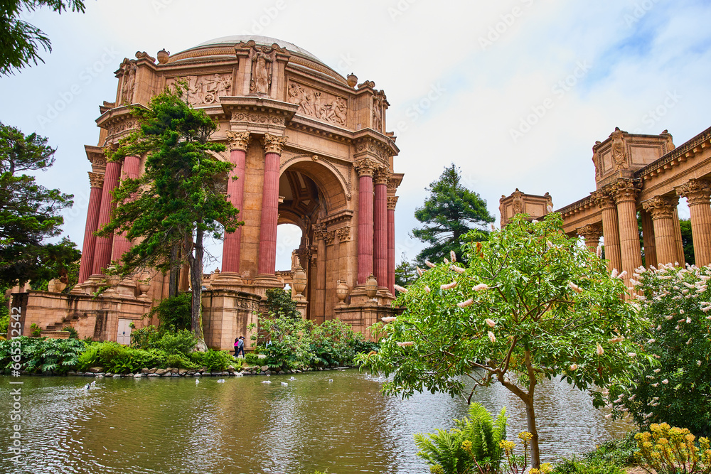 Trees around lagoon with open rotunda and Ancient Roman styled colonnade Trees around lagoon with open rotunda and Ancient Roman styled colonnade