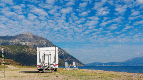 Fototapeta Naklejka Na Ścianę i Meble -  Camper van motorhome on the beach- Travel, tourism concept- Greece