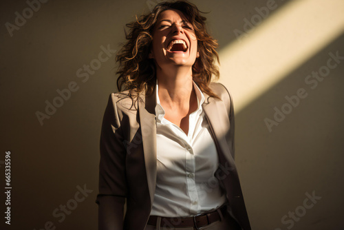 Light and shadow play, Businesswoman laughing enjoying and Both hands reached into her pants pocket