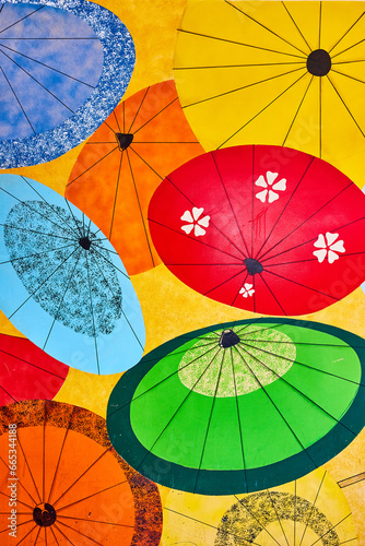 Colorful wall art of Japanese umbrellas or wagasa and janomegasa photo