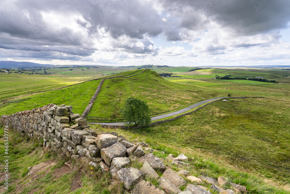 looking out at the Northumberland countryside from Hadrian's Wall Path near Once Brewed, UK