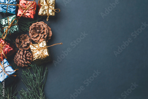 Christmas tree and gift box balls. Bokeh garlands in the blur silver golden background. Developing ideas for the new year 2024. festival of celebration happy. photo
