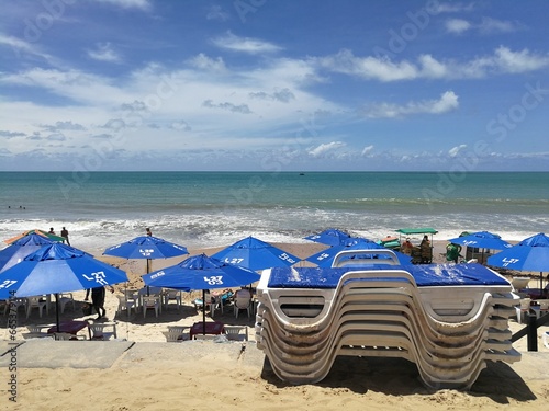 Beach with umbrellas and chairs, Ponta Negra, Natal, Rio Grande do Norte, Brazil photo