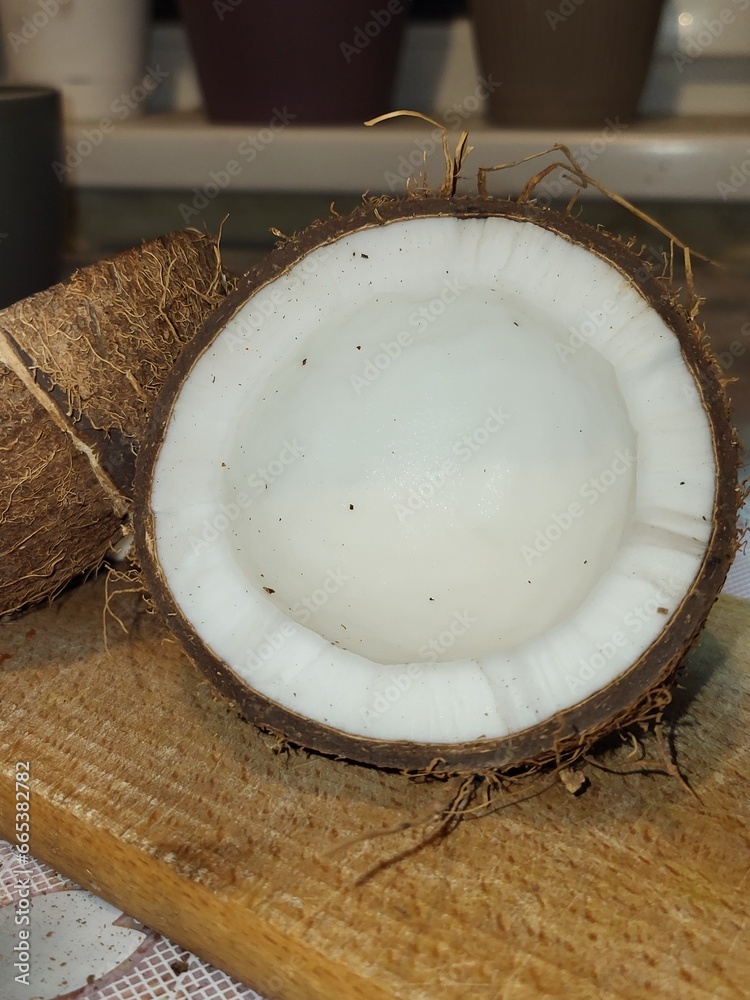 coconut on wooden table coconut on wooden table