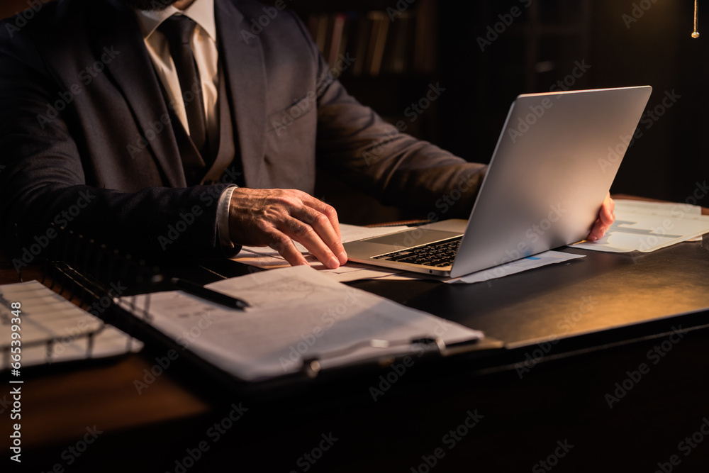 Close up shot business man hands typing pc keyboard at office background. Data analytic in formal wear check information on his laptop. Unrecognizable worker browsing notebook Close up shot business man hands typing pc keyboard at office background. Data analytic in formal wear check information on his laptop. Unrecognizable worker browsing notebook
