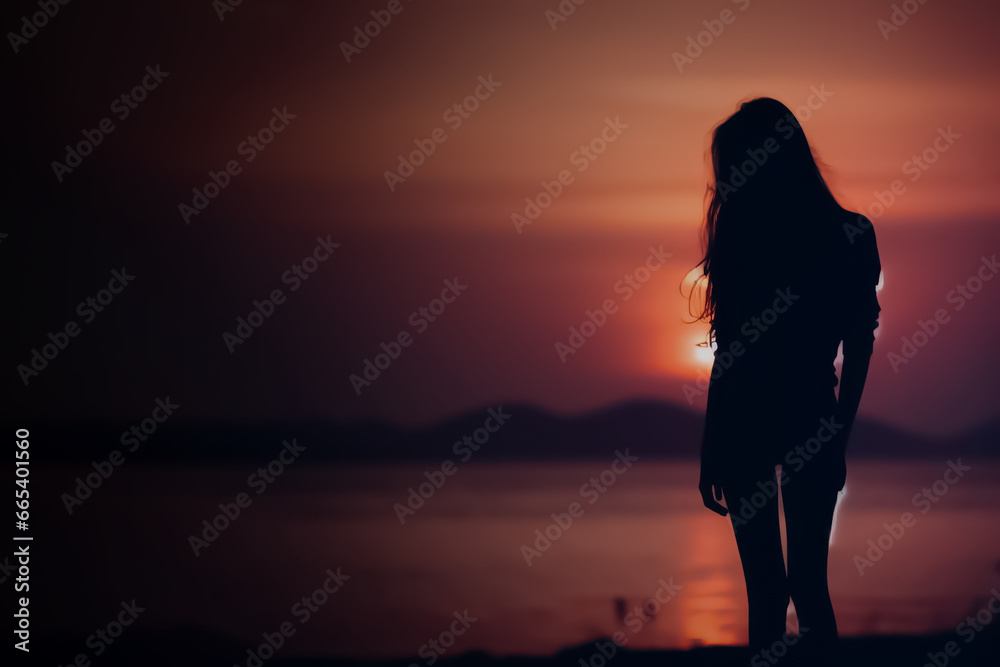 silhouette of a women on the beach