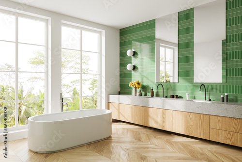 Elegant hotel bathroom interior with vanity and bathtub, panoramic window