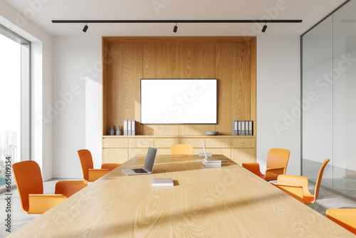 Fotografie Cozy office conference room interior with meeting table and mock up tv display