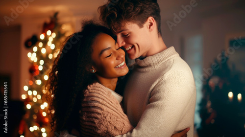 Happy young interracial married couple at christmas celebration. Christmas tree with a luminous garland in the background. Ai generated © millenius