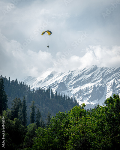 paraglider over the mountains