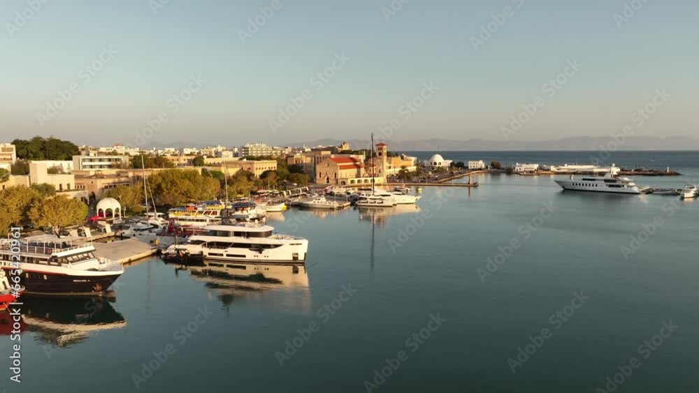 Rhodes marina and old city houses and fortifications, Aerial view Rhodes marina and old city houses and fortifications, Aerial view
