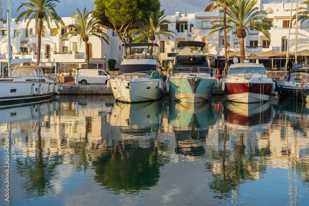 Boats and yachts moored in the marina of Cala d'Or. Balearic Islands, Majorca, Spain.
