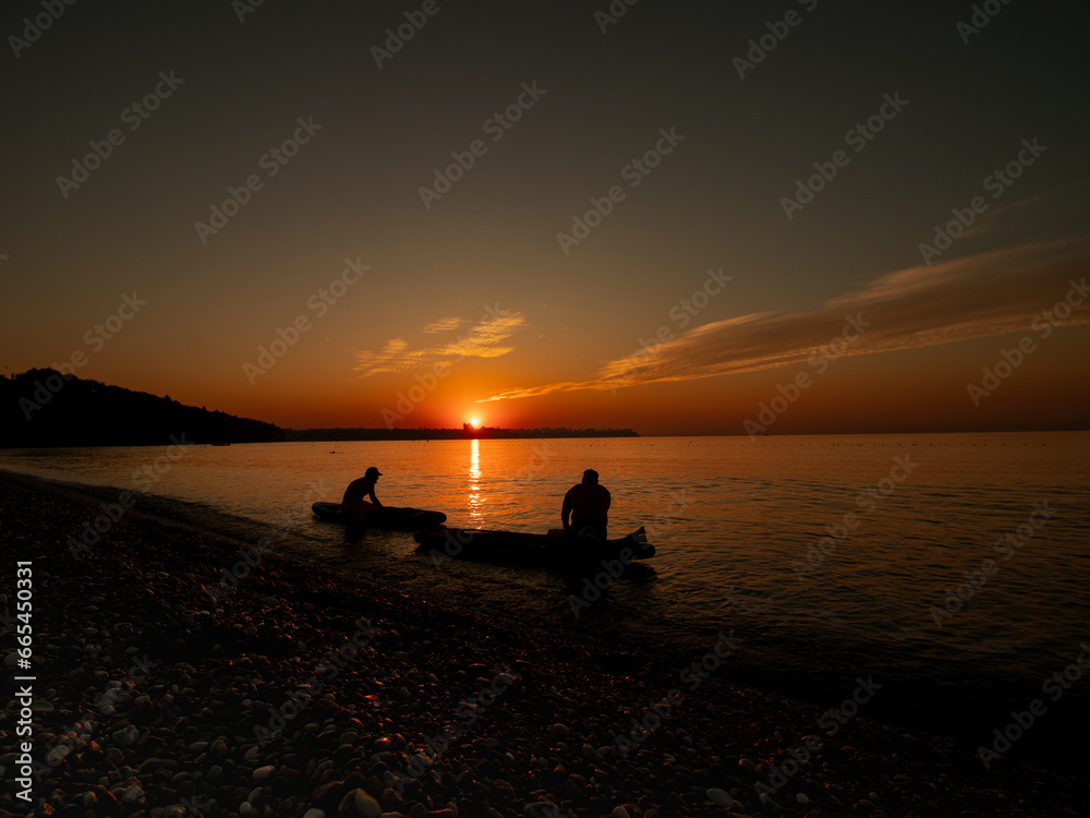 silhouette of a couple on the beach