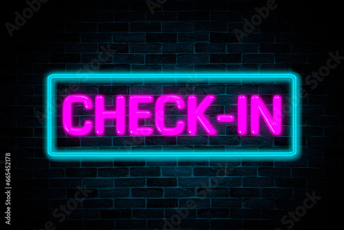 Check-in neon text on brick wall background.