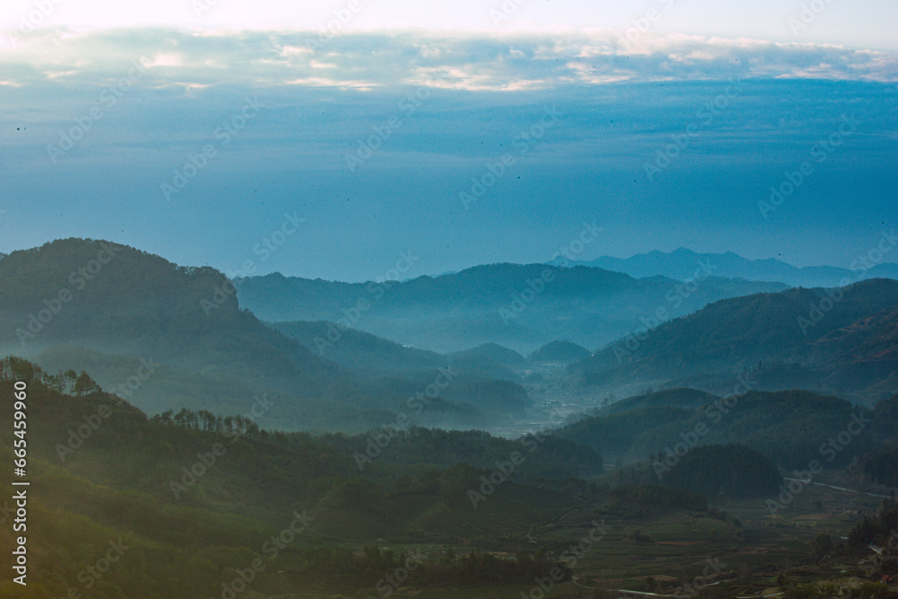 Wuyishan, Wuyishan City, Fujian Province - the view of mountains facing the sky at sunrise Wuyishan, Wuyishan City, Fujian Province - the view of mountains facing the sky at sunrise
