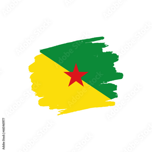 National flag of French Guiana with brush stroke effect on white background