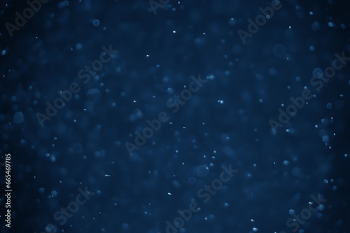 Abstract bokeh lights with blue background
