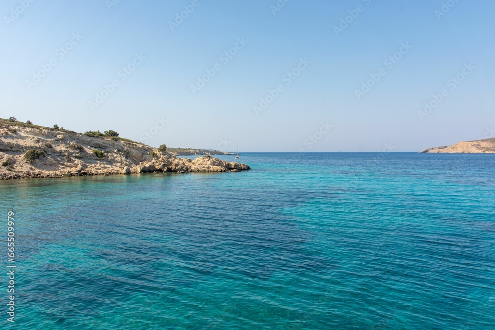 Plati - small island with church of Agios Nikolaos, Kos, Dodecanese, Greece, with beautiful bay with turquoise crystal water Plati - small island with church of Agios Nikolaos, Kos, Dodecanese, Greece, with beautiful bay with turquoise crystal water