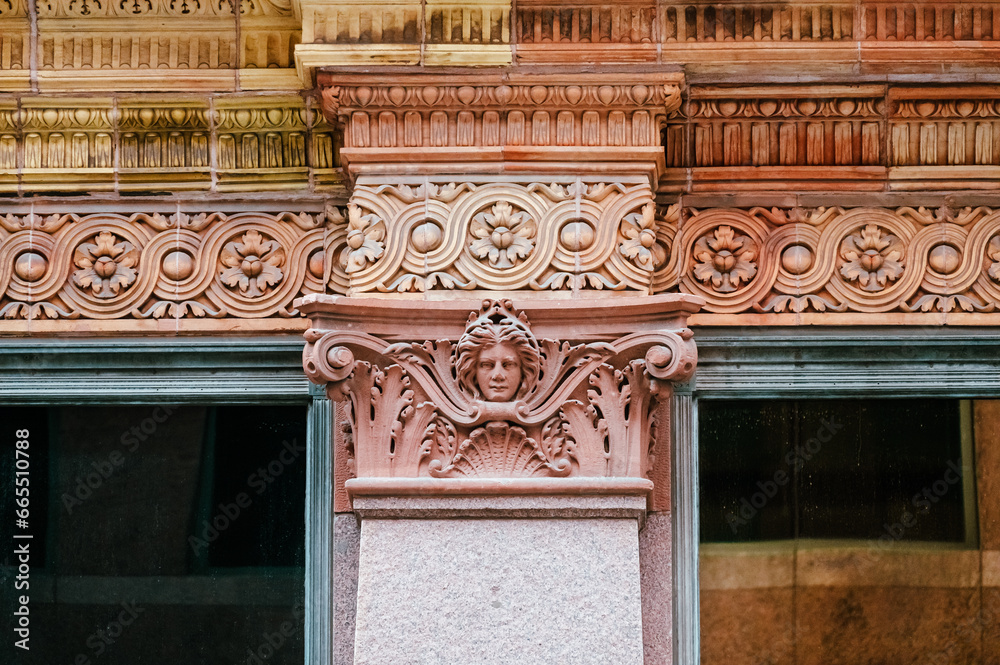 Fototapeta premium Ancient column capital decoration in Toronto, Canada