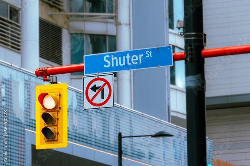Shutter St. sign and stoplight in Toronto, Canada
