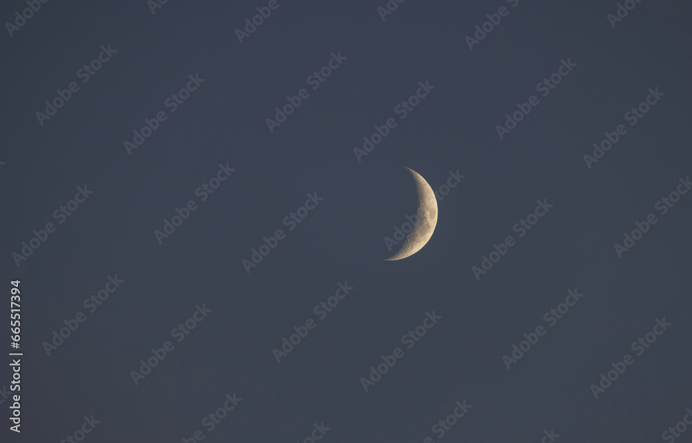 A new moon on a calm night with clear sky