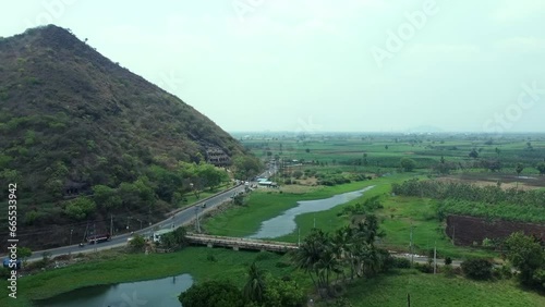 Undavalli, Vijayawada, Andhra Pradesh, India 24 March 2022  The Undavalli Caves, a monolithic example of Indian rock-cut architecture. photo