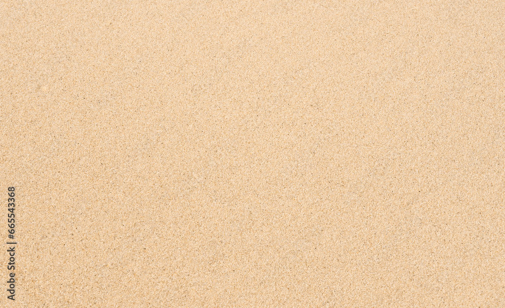 Fototapeta premium Sand beach texture surface on seaside in sunny day summer,Backdrop background nature for summer holiday vocation,Summer Sale banner with copy space
