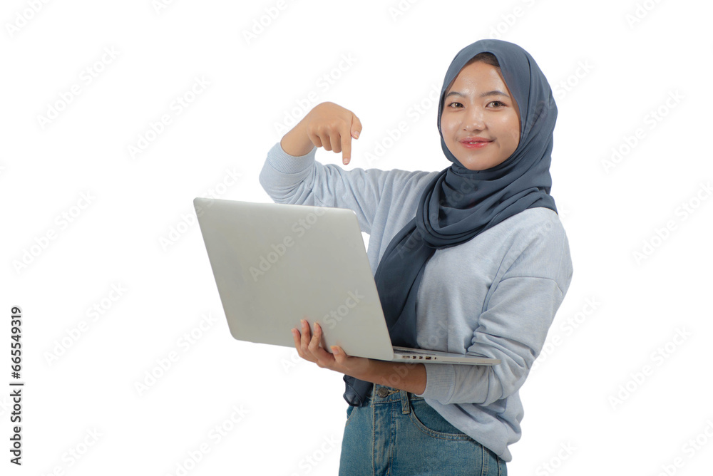 Young Asian woman in hijab pointing to laptop Young Asian woman in hijab pointing to laptop