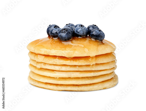Stack of tasty pancakes with blueberries and honey isolated on white