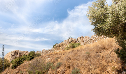 Bottom view of hill with ruins of fortress walls of the medieval fortress of Nimrod - Qalaat al-Subeiba, located near the border with Syria and Lebanon on the Golan Heights, in northern Israel