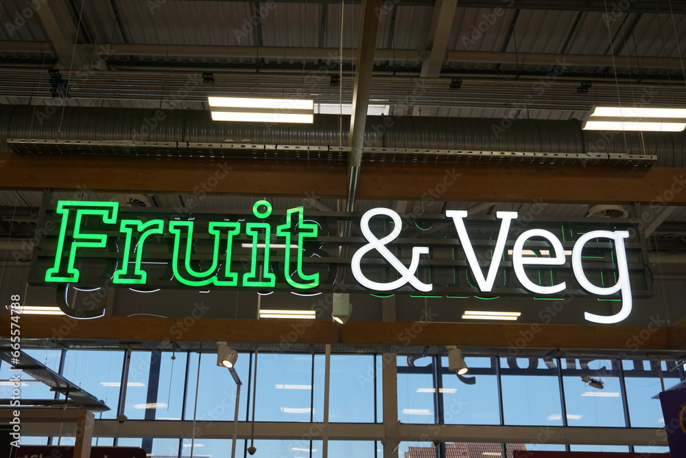 Fruit & veg sign in supermarket food isle. Healthy food section signage 