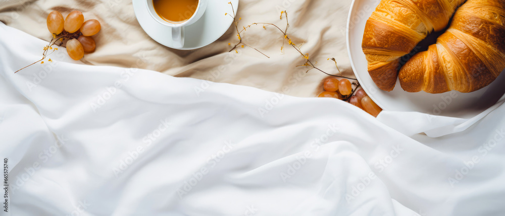 Mockup with breakfast, croissant, cup of coffee on linen sheet. Top view. breakfast on bed Morning relax,ambience. Hotels bedroom. Fall or winter leisure. Still life composition.Generative ai Mockup with breakfast, croissant, cup of coffee on linen sheet. Top view. breakfast on bed Morning relax,ambience. Hotels bedroom. Fall or winter leisure. Still life composition.Generative ai
