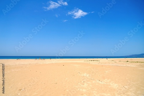 Fototapeta Naklejka Na Ścianę i Meble -  gorgeous beach in Tarifa at a beautiful summer day, Playa de los Lances, Playa Santa Catalina, Andalusia, province of Cádiz, Spain