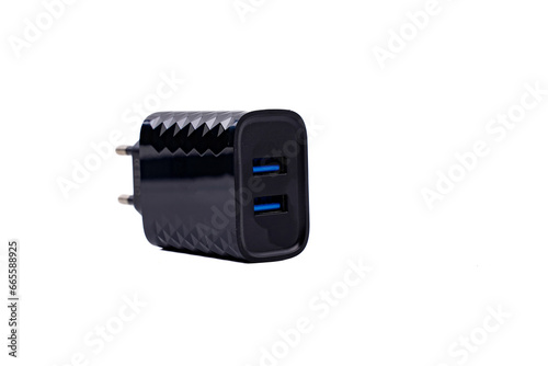 Smartphone quick USB dual port black wall charger isolated on white background.